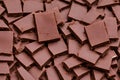 Carelessly broken bars of dark chocolate, generated by artificial intelligence