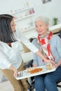 Carer has prepared meal Royalty Free Stock Photo