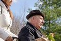 Carer taking an elderly man grocery shopping Royalty Free Stock Photo