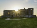 Carew Castle Pembrokeshire with the Millpond and Sunset