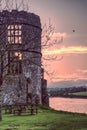 Carew Castle Pembrokeshire with the Millpond and Sunset