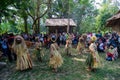 Malaysia indigenous Mah Meri tribesmen dance in kampung.