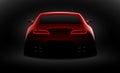 Realistic red sport car back view with on rear lights in the dark Royalty Free Stock Photo