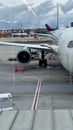 Cargo being loaded into the Plane as it gets ready for its flight to its next destination. Royalty Free Stock Photo