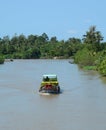 A cargo boat running on river in southern Vietnam Royalty Free Stock Photo