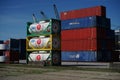 Cargo container and gaz tanks stacked on LeixÃÂµes harbor Matosinhos Portugal wait to be shipped by cargo ship