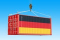Cargo container with German flag hanging on the crane hook again Royalty Free Stock Photo