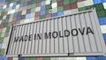 Cargo container with MADE IN MOLDOVA caption. Moldovan import or export related 3D rendering