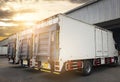 Cargo container truck parked loading at dock warehouse. Industry cargo freight shipment. Logistics and transportation. Royalty Free Stock Photo