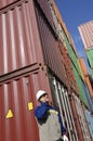 Cargo containers and dock worker