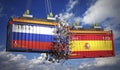 Cargo containers with flags of Russia and Spain Royalty Free Stock Photo