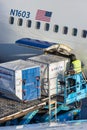 Cargo containers loaded on board of a Delta Airlines airplane on Schiphol Airport, The Netherlands