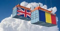 Cargo containers with Romania and United Kingdom national flags.