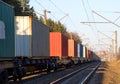 Cargo containers transportation on freight train by railway. Coronavirus Wreaks Havoc On Global Industry. Global economy is