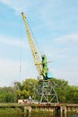 Cargo crane in abandoned river harbor Royalty Free Stock Photo