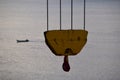 Cargo crane hook on the container ship