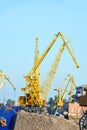 Cargo crane, ship and pig iron Royalty Free Stock Photo