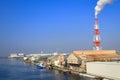 Cargo Hold Japan Coastal Ship is moored at  Industrial port  surrounded by factory buildings on Osaka Bay,Japan Royalty Free Stock Photo