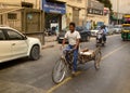 cargo Indian Bicycle rickshaw in traffic.