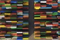 Cargo industrial containers stacked in rows of different colors for logistics import-export business