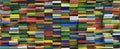 Cargo industrial containers stacked in rows of different colors