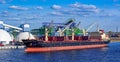 Cargo operations in the trading port Royalty Free Stock Photo