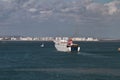 Cargo and passenger ferry goes to sea. Cadiz, Spain Royalty Free Stock Photo