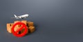 Cargo plane, boxes and red prohibition symbol NO. Embargo and sanctions. A ban on flights. Non-flying zone. Lack of air transport Royalty Free Stock Photo