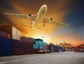 Cargo plane flying above container dock and ship port use for tr