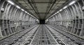 Interior of a large cargo plane showing the loading area and structural framework Royalty Free Stock Photo