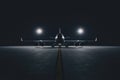 Cargo Plane Loading at Night Under Strong Lights Royalty Free Stock Photo