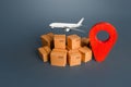 Cargo plane over boxes and red pin geolocation symbol. Services of express delivery and transportation of goods by plane. World