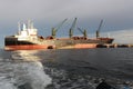 Cargo ship adrift at sea.