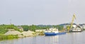 cargo ship on the banks of river Svir, Mandrogi, Russia