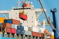 Cargo ship being loaded at the port of Iquique