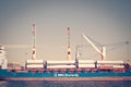 Cargo ship being loaded in the port of San Deigo