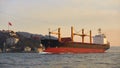 A cargo ship in the Bosphorus, Istanbul, Turkey. Royalty Free Stock Photo