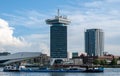 Cargo ship on the channel and the Eye Film Museum and modern buildings on the waterfront in Amsterdam, Netherlands Royalty Free Stock Photo