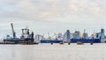 cargo ship on Chao Phraya river and city scape in Bangkok, Thailand