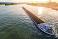 Cargo ship with coal bulk load on the river Rhine in Mainz, Germ Royalty Free Stock Photo