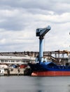 Cargo ship, containers and crane Royalty Free Stock Photo