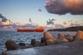 Cargo ship with containers on the harbour. Sea port Varna, Bulgaria