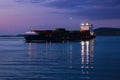 Cargo ship sailing at night Royalty Free Stock Photo