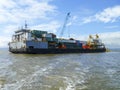 The cargo ship with the crane, the top view. Pipelaying barge.