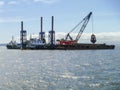 The cargo ship with the crane, the top view. Pipelaying barge.