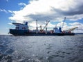 The cargo ship with the crane, the top view. Pipelaying barge. Royalty Free Stock Photo