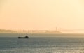 Cargo ship cruising the shores of Naoshima Island.