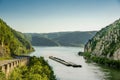 Cargo ship at Danube gorge in Djerdap on the Serbian-Romanian border Royalty Free Stock Photo