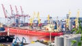 Cargo ship and Dockyard cranes Royalty Free Stock Photo