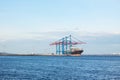cargo ship fixed in sea port Royalty Free Stock Photo